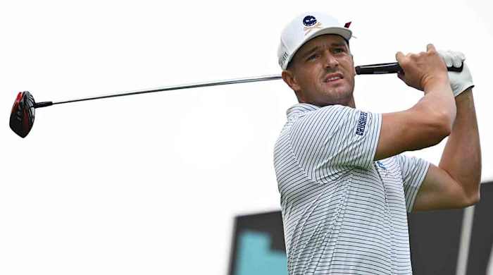 Bryson DeChambeau tees off from the third tee box during the first round of the 2023 LIV Golf Chicago golf tournament at Rich Harvest Farms.